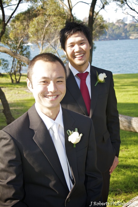 Groom laughing with best man - wedding photography sydney